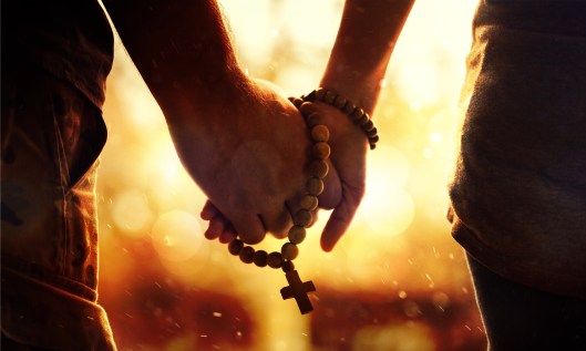 Couple Praying Rosary Holding Hands